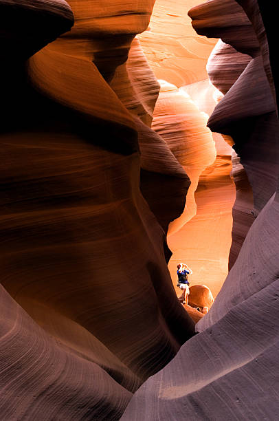 istock Hiker in slot canyon 139887150