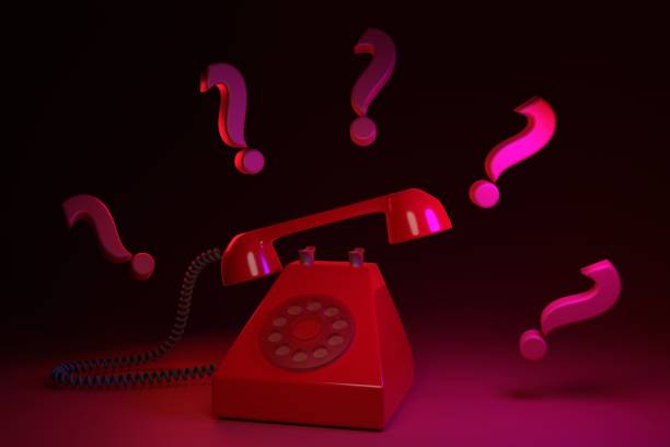 istock Unknown call concept. Retro phone in red color with question marks. 3D render. 1398873514