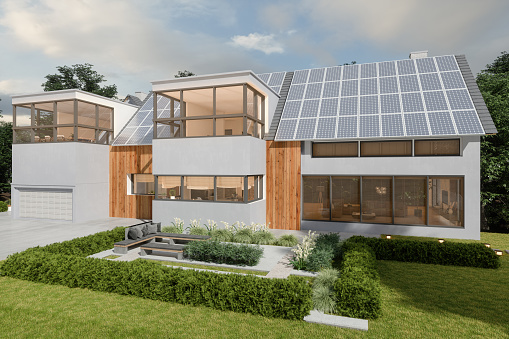Modern Villa With Solar Panels On The Roof And Patio With Seats