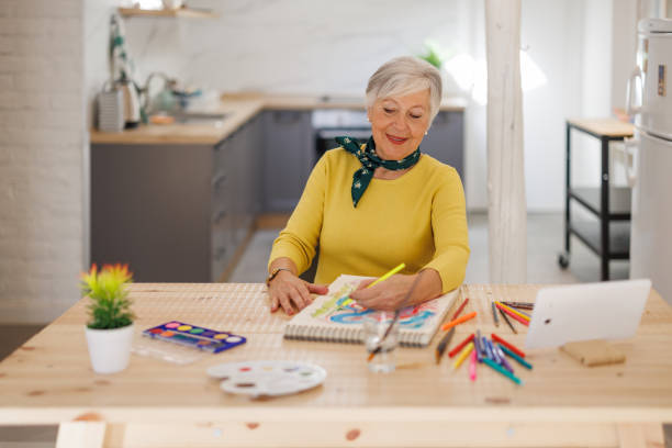 istock Painting therapy at the retirement home 1398873844