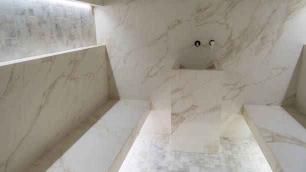 istock Classic turkish hammam. White turkish bath with marble surfaces. Marble oriental bathroom. Steam bath interior. 1398875439