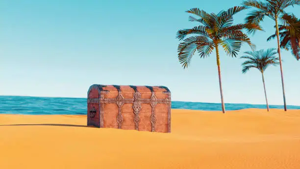 Old treasure chest is partly hidden on beach with palm trees.