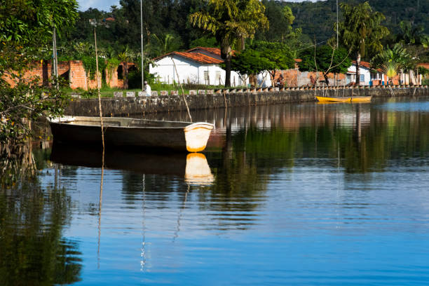 istock Boat stopped on the river among the trees. 1398876707