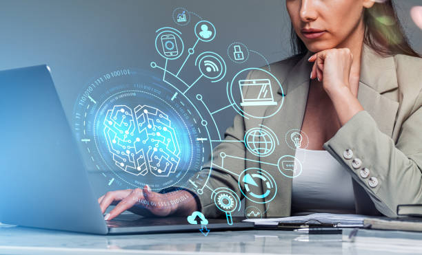 istock Businesswoman in suit is typing on laptop with digital interface 1398877710