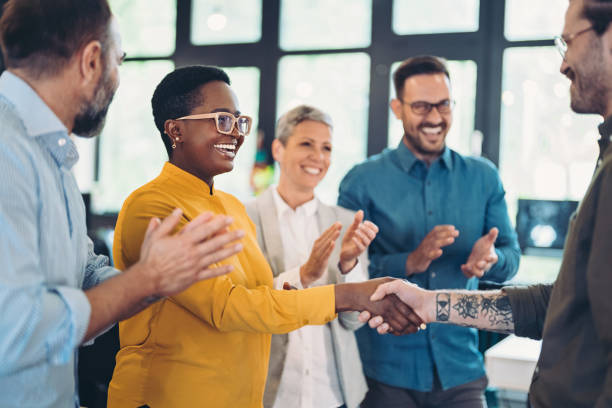 istock Congratulating the new team member 1398879640