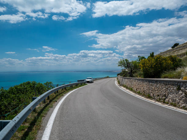istock Road with a view over the sea 1398879807