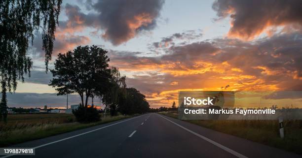 Dramatic Sunset On Beautiful Urban Road Stock Photo - Download Image Now - Asphalt, Awe, Beauty
