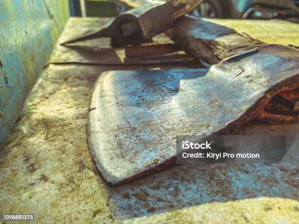 The Ax Lies On A Metal Bench A Tool For Cutting Wood Building A House Working With Wood Metal Ax With Handle Made Of Natural Material Stock Photo - Download Image Now