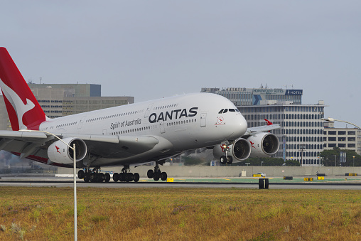 Los Angeles, California, USA - May 22, 2022: image of Qantas Airbus A380-842 with registration VH-OQD shown touching down at Los Angeles International Airport, LAX.