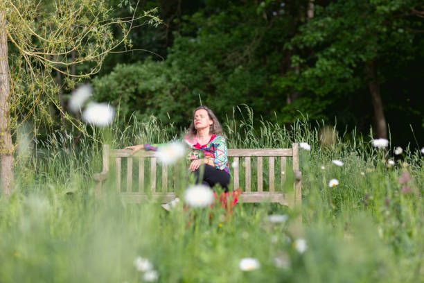 Free Stock Photo of Woman Sitting on Bench in Park | Download Free ...