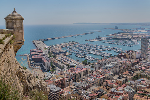 Buildings, the harbor and the Mediterranean Sea viewed from Castell de la Santa Bàrbara on Mount Benacantil.