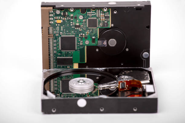 istock The chip is reflected in the plate of the open hard disk 1398884013