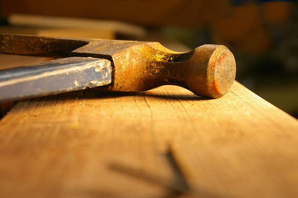 hammer on bench stock photo