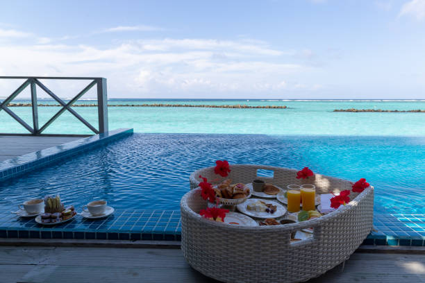 istock Breakfast served in a floating heart in a swimming pool 1398888294