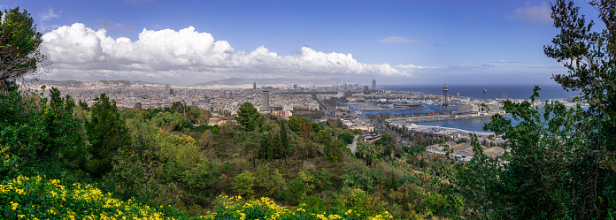 Ultra large panorama of Barcelona city from high angle shot from Montjuic gardens