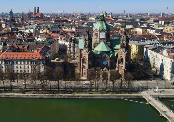 Drone shot of St. Lucas with Isar, Munich, Germany Drone shot of St. Lucas with Isar, Munich, Germany munich airport stock pictures, royalty-free photos & images