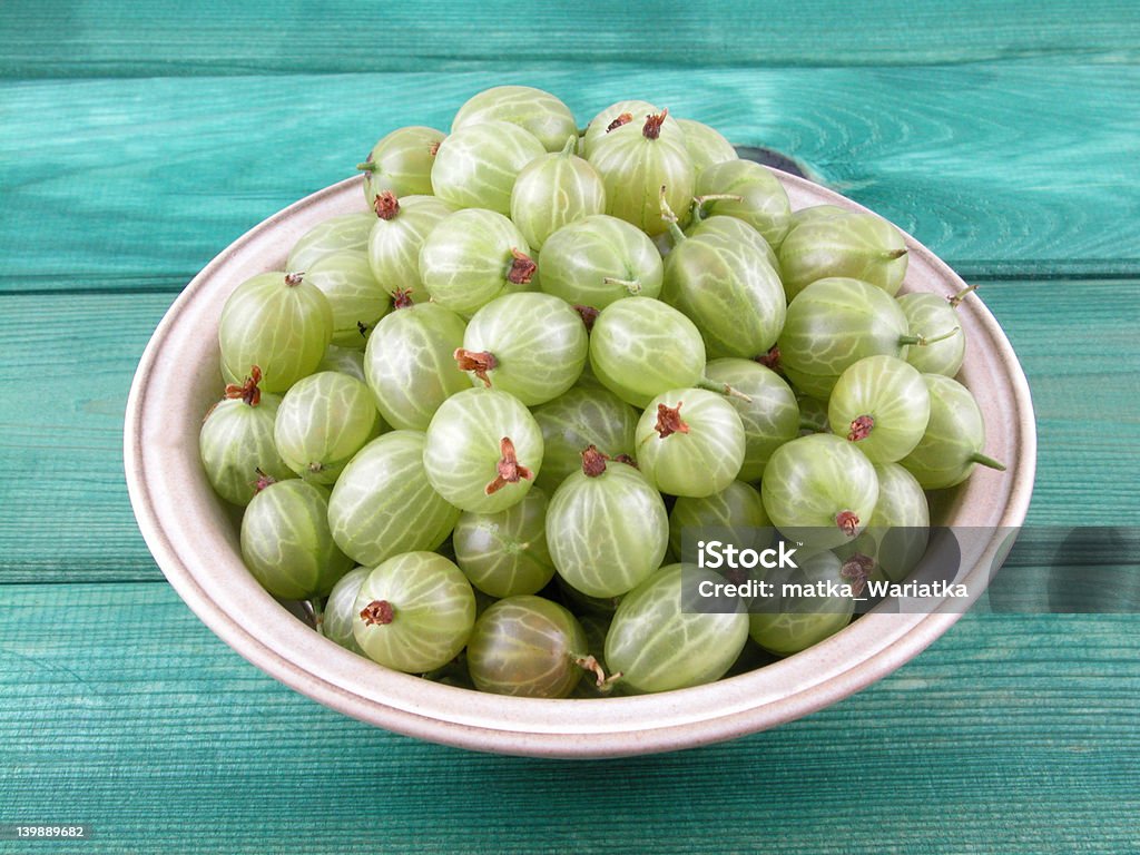 gooseberries bowl full of fresh gooseberries           Agriculture Stock Photo