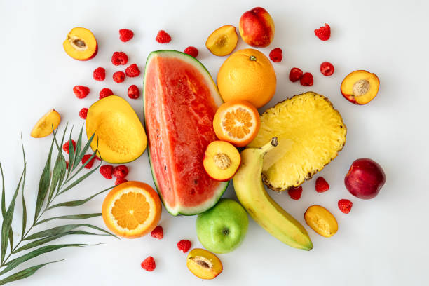 istock Tropical fruits on a white background top view. 1398897784