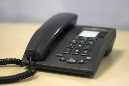 A Modern Sleek Office phone in Black