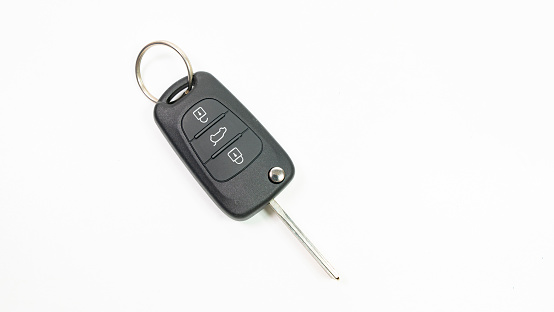 Car key on white background