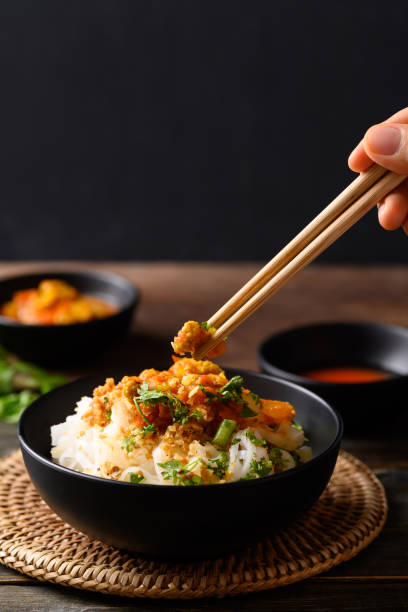 istock Rice noodle mixed with spicy tomatoes sauce 1398906443