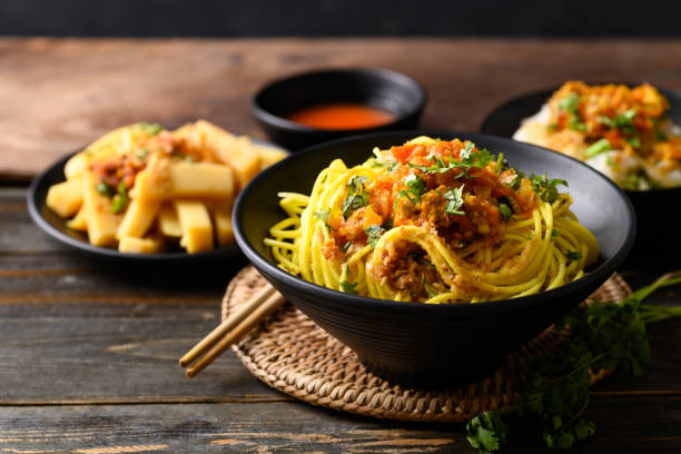 istock Noodle mixed with spicy tomatoes sauce 1398906472