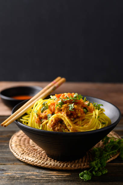 istock Noodle mixed with spicy tomatoes sauce 1398906487