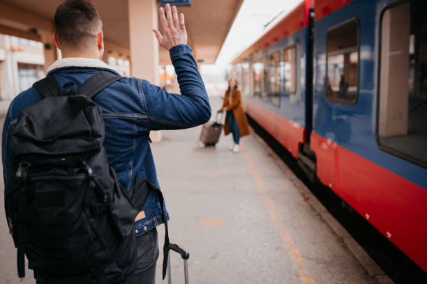 https://media.istockphoto.com/id/1398907508/photo/couple-at-the-train-station.jpg?b=1&s=170667a&w=0&k=20&c=irnkk0FniuARLJLEz0bBba5FAtmahQ3zhvutGAWIngo=