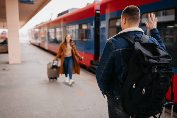 istock Couple at the train station 1398907657