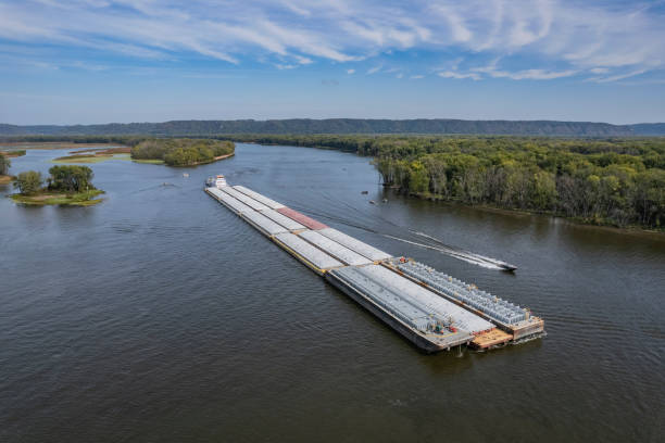 Towboat pushing barges south on the Mississippi River.