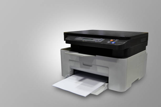istock two color, black and white plastic printer and white paper on grey background, technology, object, office, decor, copy space 1398917996