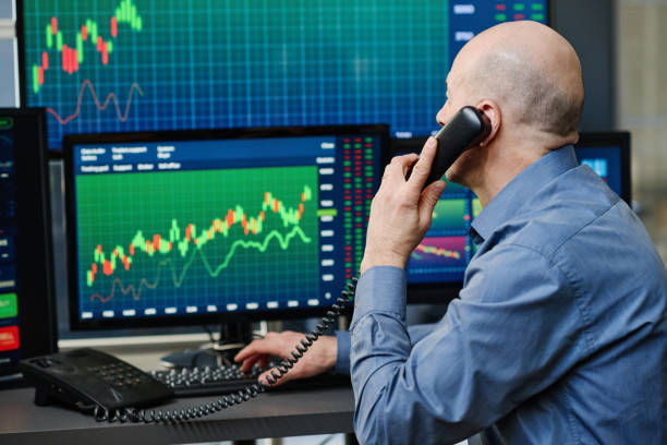 istock Stock Trading Specialist At Work 1398920500
