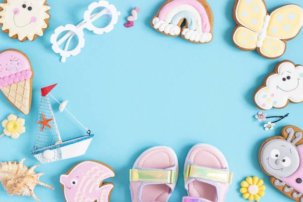 istock Bright creative layout made of cute summer symbols with copy space on blue background. Top view, Flat lay. Creative summer concept 1398920513