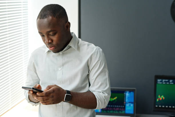 istock Reading News On Smartphone 1398922586