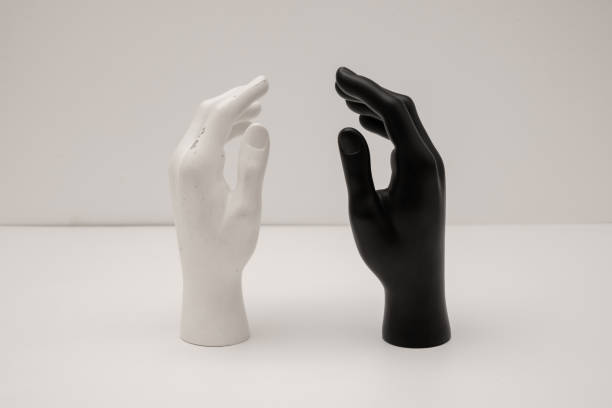 istock Old shabby mannequin hands on a white background 1398924112