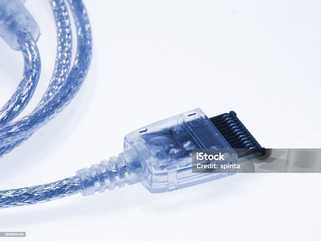 Phone cable Mobile phone USB cable isolated on white. Blue Stock Photo