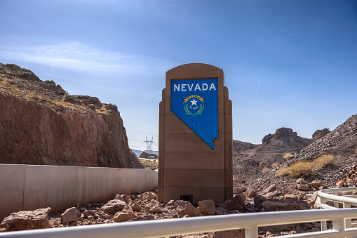 May 22, 2022 - Boulder City, United States: A welcome to Nevada sign located at the Mike O'Callaghan–Pat Tillman Memorial Bridge close to the Hoover Dam in Boulder City, Nevada