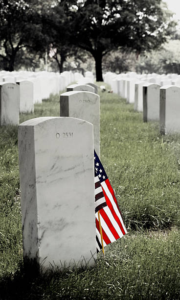 istock Gravestone and American Flag 139893405