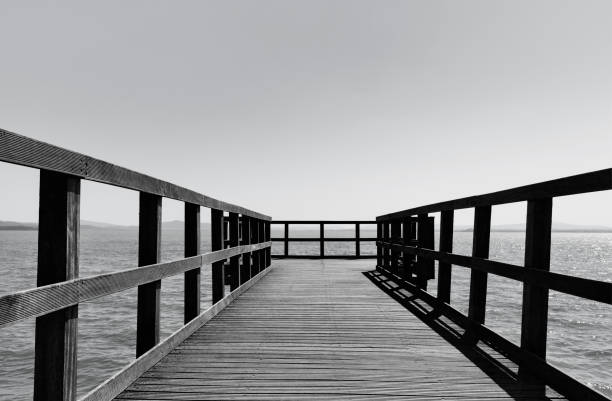 istock Wooden pier black and white 1398936900