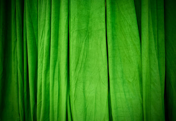 istock Green curtains in equipment light, Backgrounds 1398937135