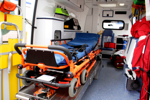 Ambulance interior details. Emergency equipment and devices visible