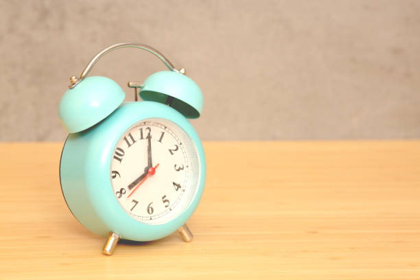 istock date and time on plywood background 1398938819