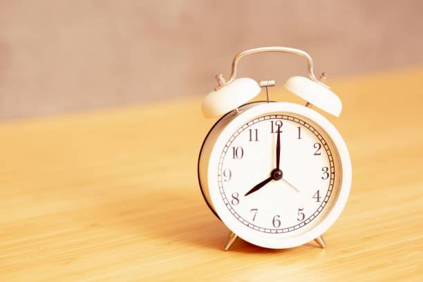 istock date and time on plywood background 1398938946