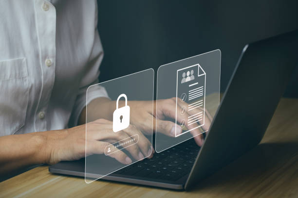 istock Businessmen protecting personal data on laptop and virtual interfaces. 1398939304