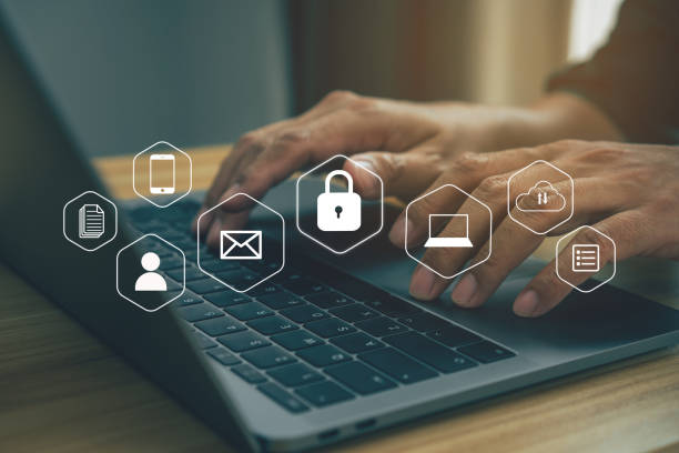 istock Businessmen protecting personal data on laptop and virtual interfaces. 1398939855