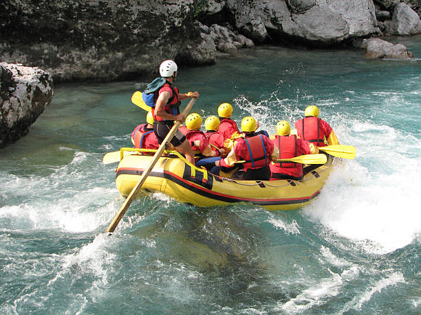 White water rafting White water rafting on the rapids of river Soca, Slovenia, Triglav national park inflatable raft stock pictures, royalty-free photos & images