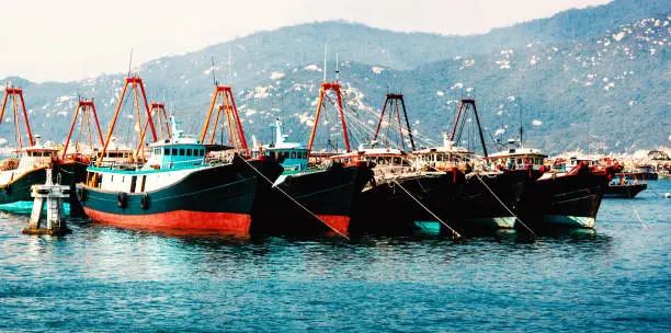 Photo of Fishing ships in the bay in Hong Kong