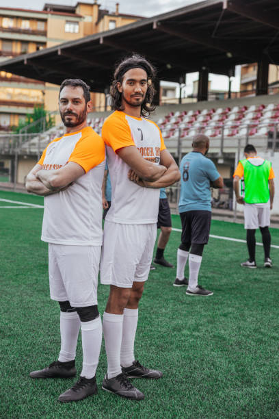 istock Football team portraits 1398941932