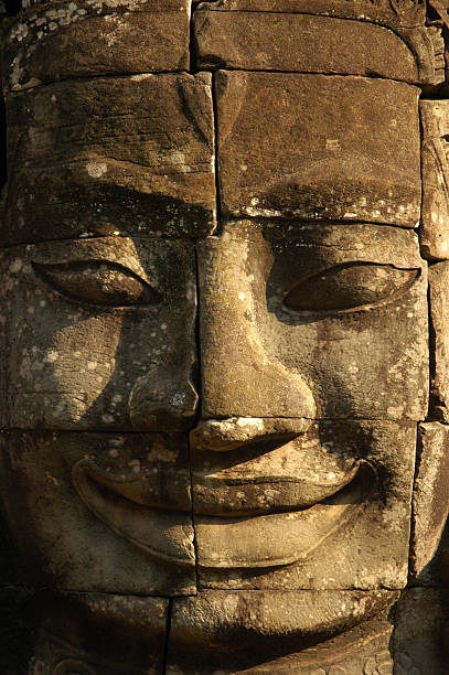 sculptured face, cambodia stock photo