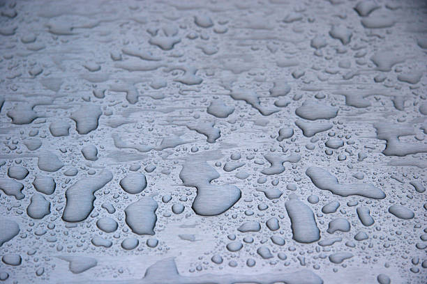 Water Drops on Stainless Steel stock photo